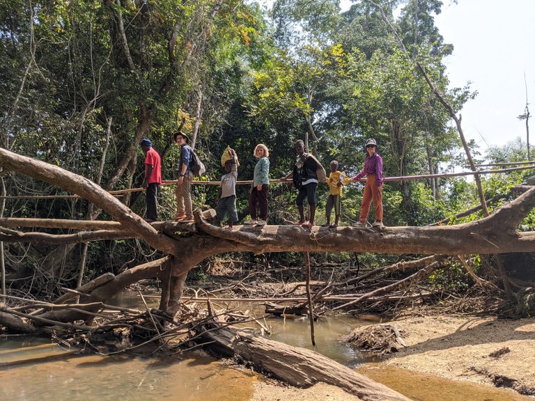 Crossing the river on the way back from the farm