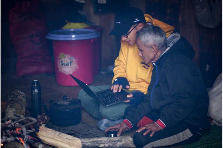 A Kieu's father was very curious when I was using my macbook next to the fire.