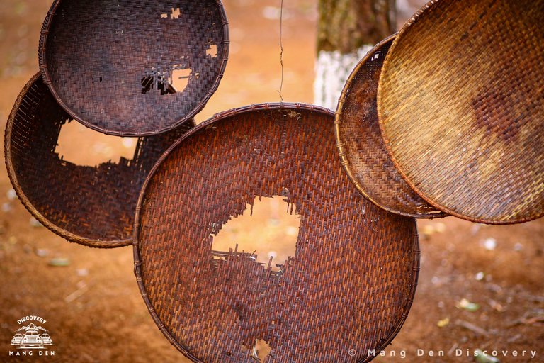 The flat winnowing baskets are made from bamboo.