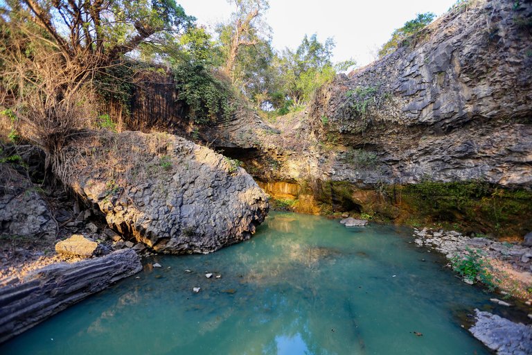 The cave behind the waterfall