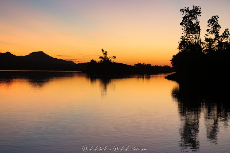 This is Hoa Trung lake, a large natural lake in the mountains of Hoa Bac, Danang. It is surrounded by mountains. This is a great camping and SUP rowing spot with beautiful views and flat water.