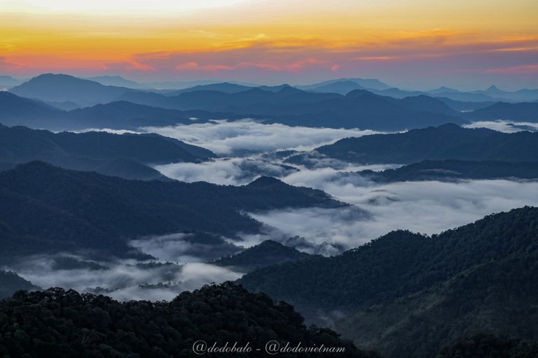The rolling mountains in Tay Giang mountainous district in Quang Nam at sunset.