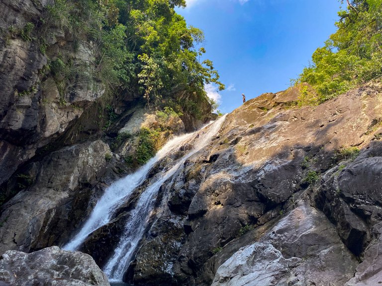 You can tell how tall this waterfall is by looking at my friend at the top of it.