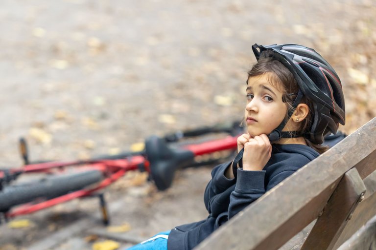 cute-little-girl-wearing-protective-bicycle-helmet.jpg