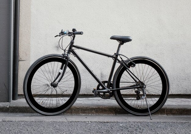 vintage-black-small-bicycle-outdoors_23-2148907965.jpg