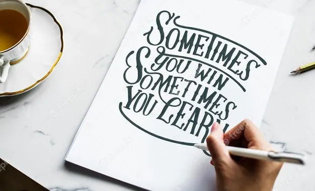 artist-creating-hand-lettering-artwork_53876-105705.webp