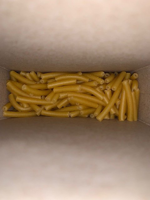 Close up of elbow pasta at the bottom of the box.jpg