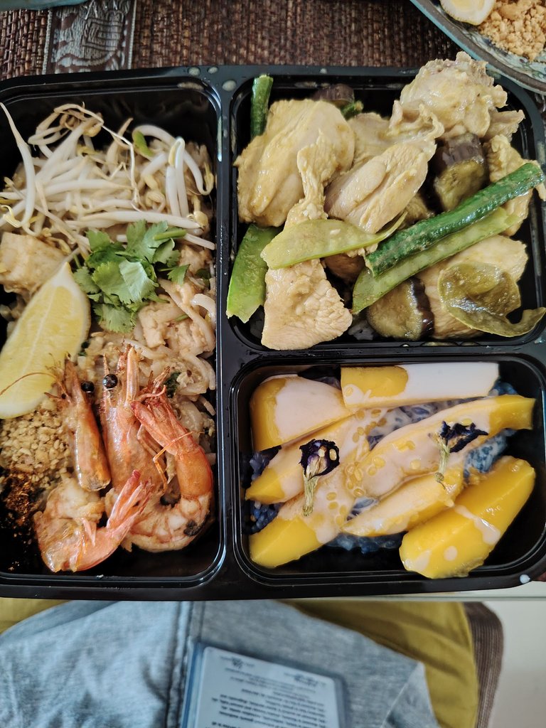 Chicken green curry, shrimp Pad Thai, and mango sticky rice—my own little inflight meal on the ground.