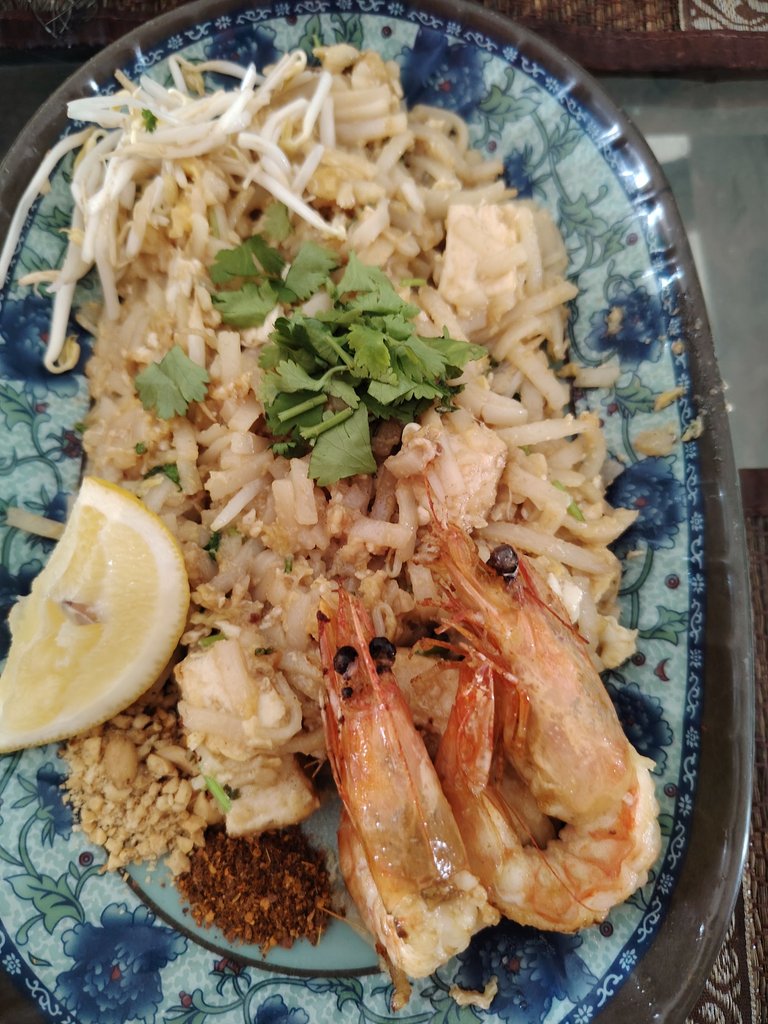 Shrimp Pad Thai—flat noodles, prawns, peanuts, and chili for that classic Thai style 