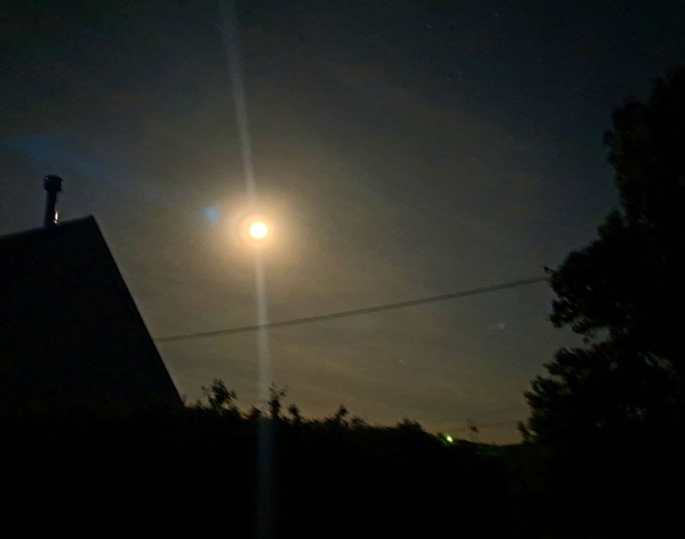 The moon over the house