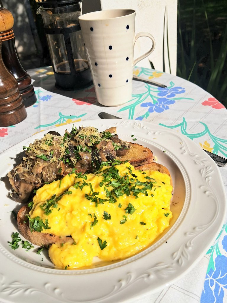 Comfort food:  creamy scrambled eggs and mushrooms on sourdough bruschetta