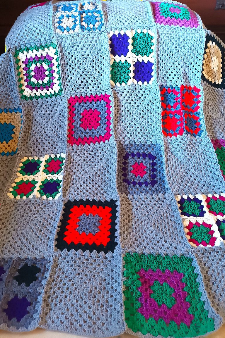 The first of two scrap-inspired knee rugs