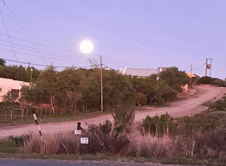 The rising moon from the corner of the stoep