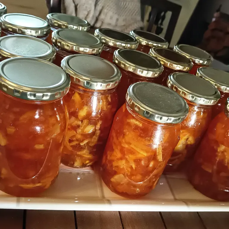 Three Fruit Marmalade jars waiting to have their faces washed and labels added