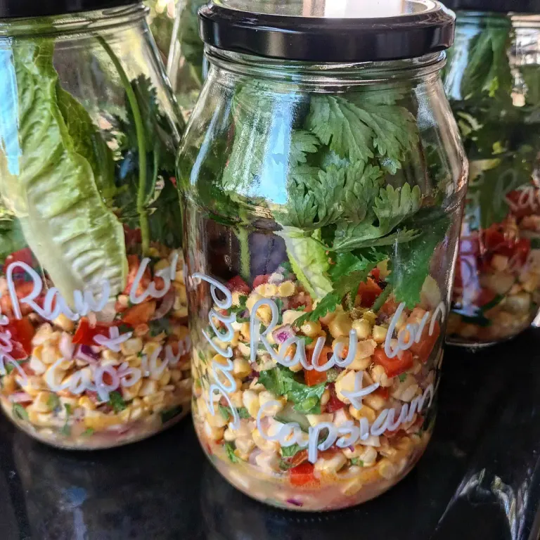 In the jar:  raw corn salad and capsicum salad