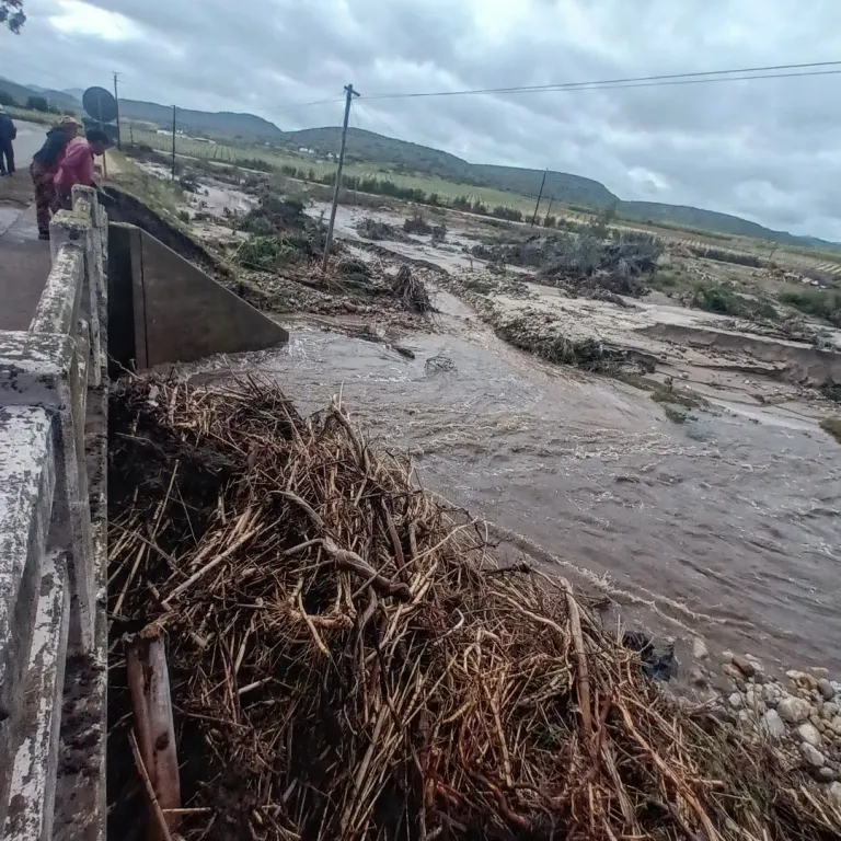 Looking over bridge - debris and cottages gone