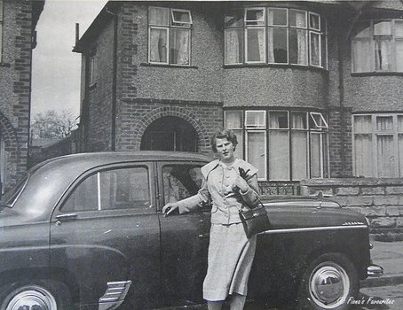 My mother outside her mother's home in the UK - late 1950s