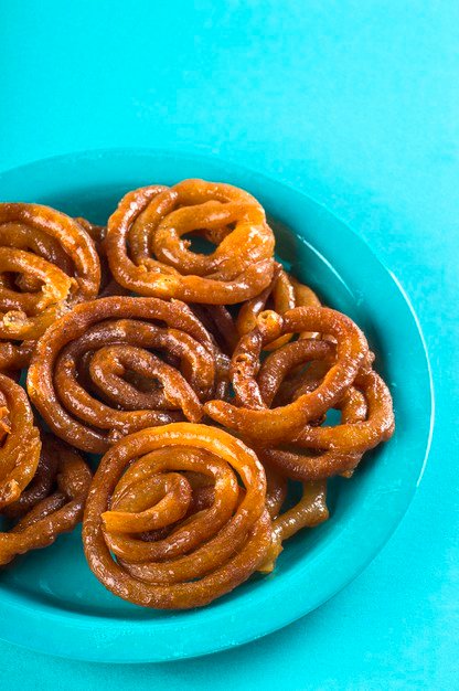 indian-sweet-jalebi-indian-dessert-jalebi-imarti-imarati-jilbi-blue_136354-6496.jpg