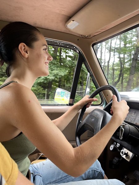 Phoebe driving truck crop July 2024.jpg