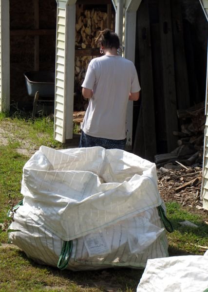 Lee unloading next to last bag crop August 2024.jpg