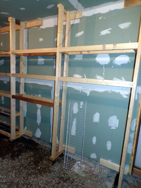 Construction- root cellar- shelving supports finished crop Feb. 2023.jpg