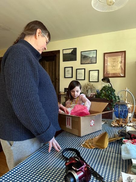 Pam, Hazel opening presents7 crop Feb. 2024.jpg