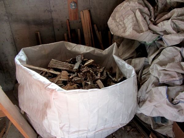 Bag of kindling in cellar crop August 2024.jpg