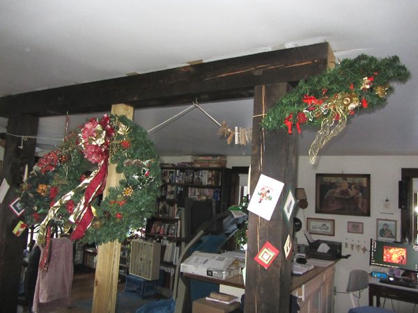 Wreathes over wood stove crop Jan 2025.jpg