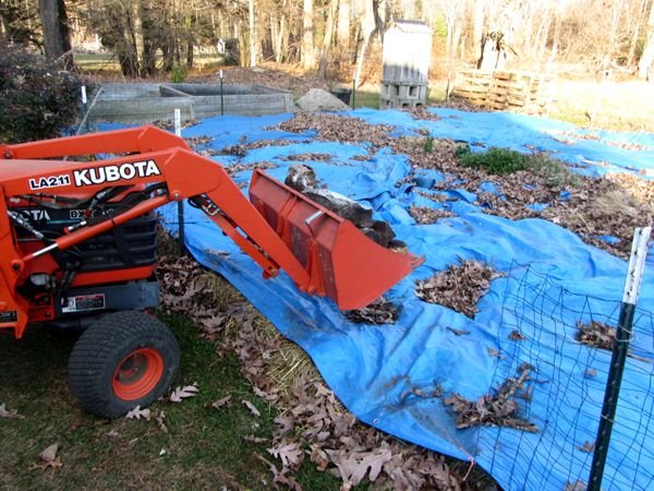 Moving wood with Kubota crop Nov 2024.jpg