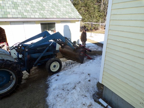 Corky with splitter in tractor crop Feb. 2021.jpg