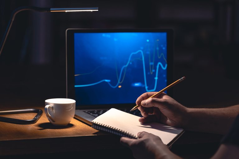 man-trading-browsing-online-stock-investments-night.jpg