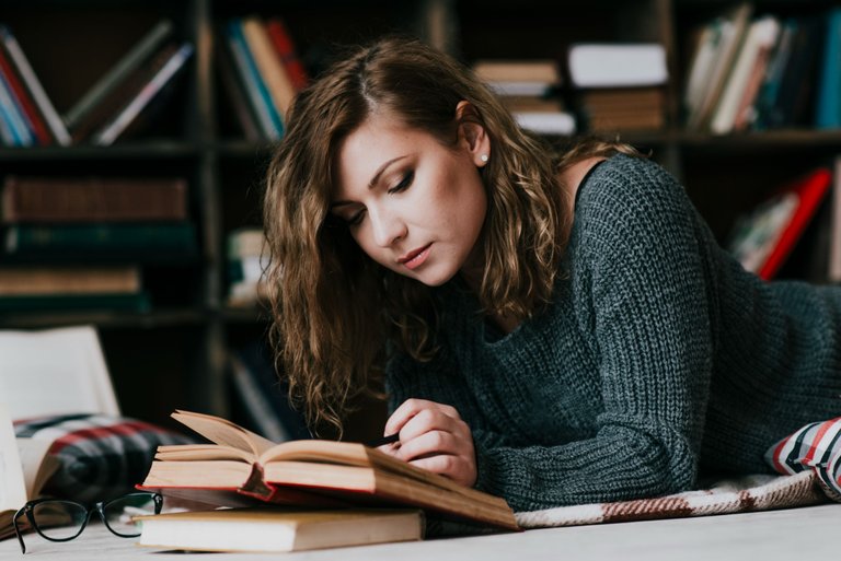 woman-reading-book-floor.jpg