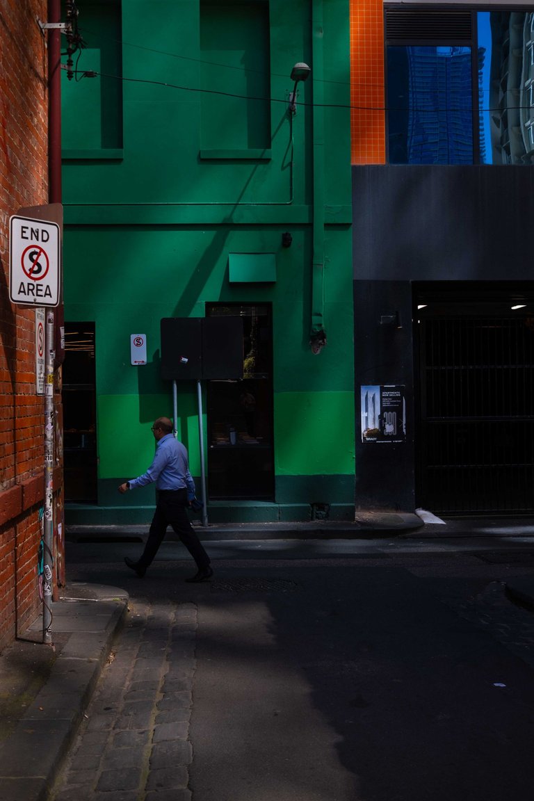 Walking past a green building 1 (1 of 1).jpg