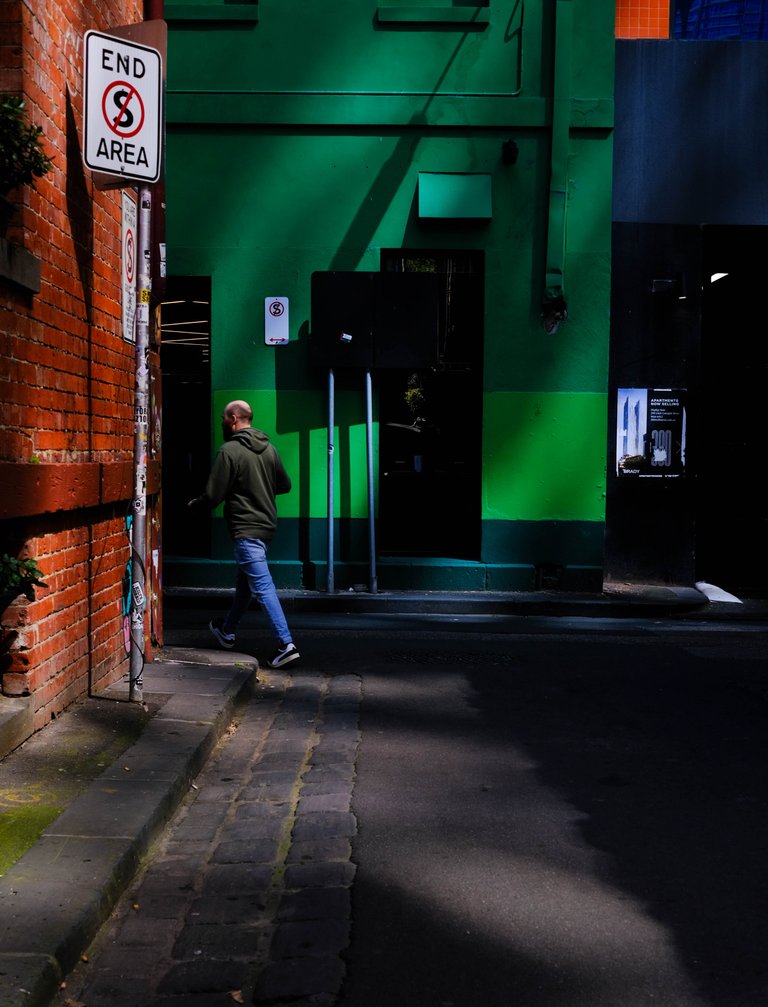 Walking past a green building 2 (1 of 1).jpg