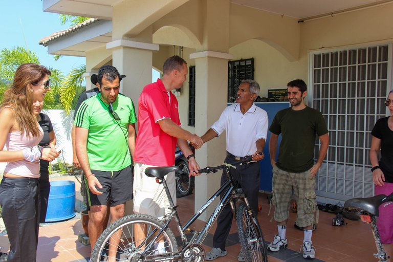 Handing Over the Bicycles