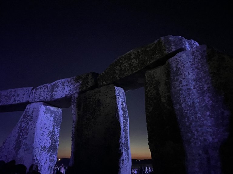 Last colors of the Sunset trough the Holy Stones, Summer Solstice, Stonehenge, UK, 2024 