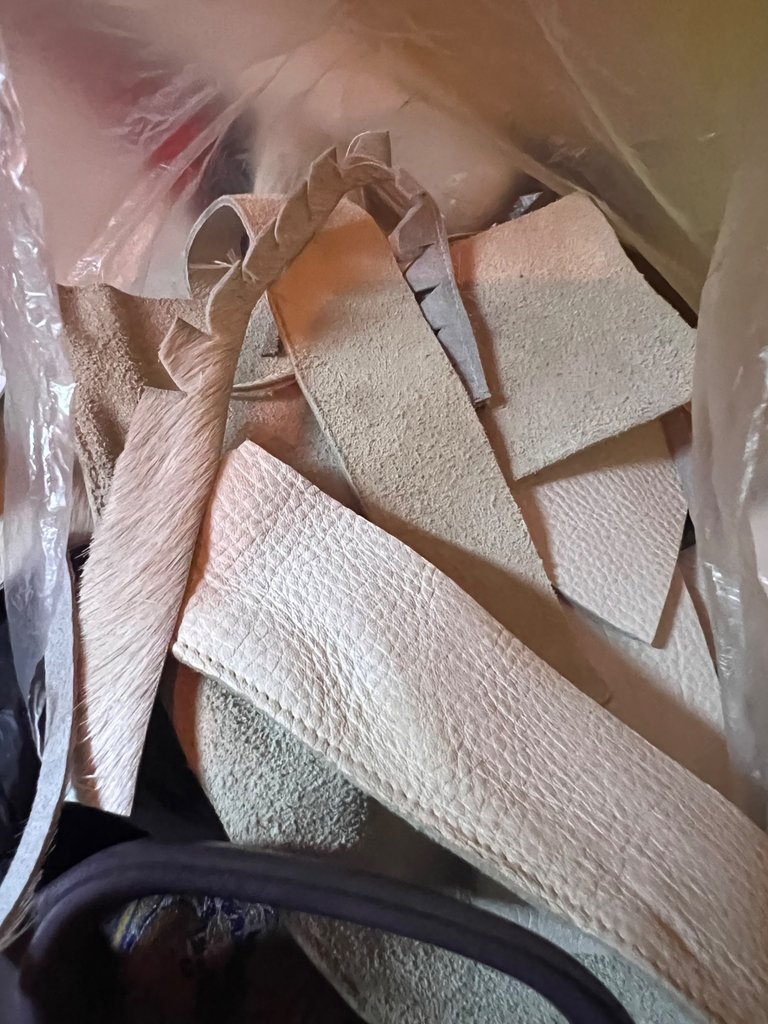 The Bag of White Leather Scraps