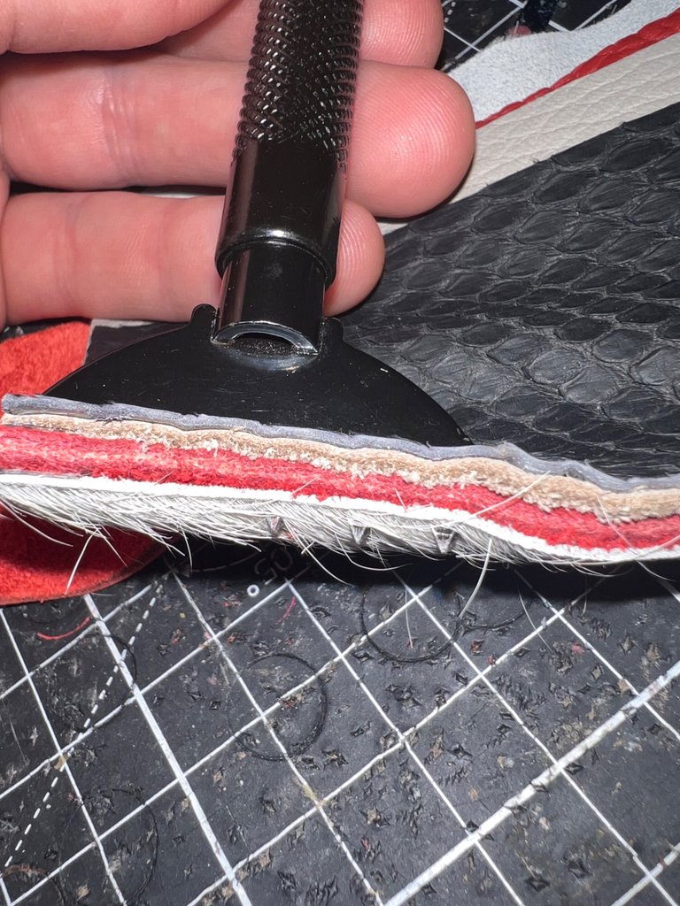 "The Leather Sandwich having quite of a resistance when comes to poking the holes"