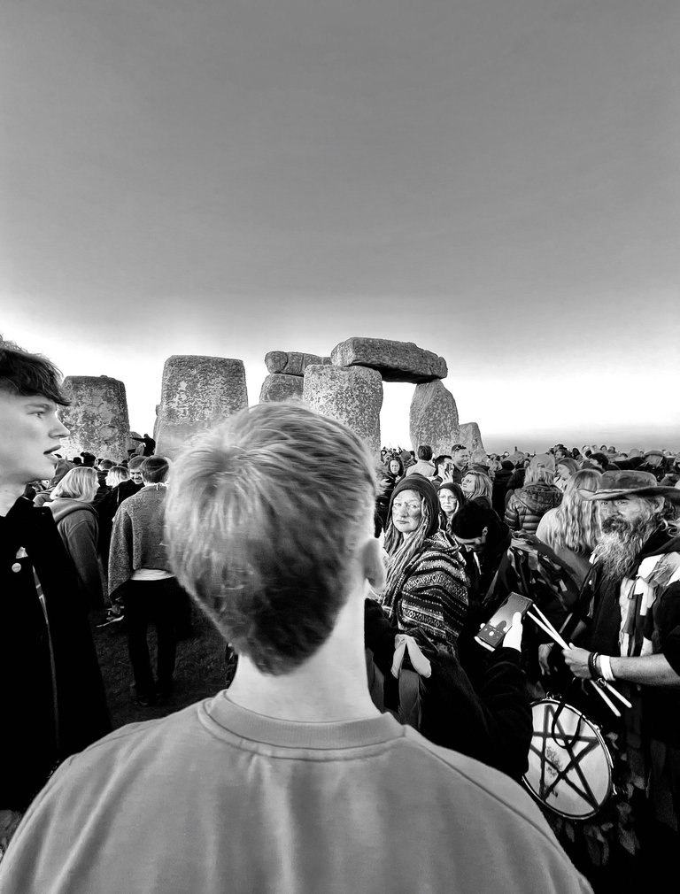 Old Gods impressing the young crowd, “Play that drum, play it good”, Stonehenge, summer solstice, UK 2024