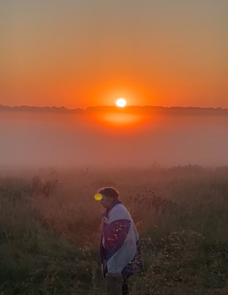 Sunrise Walk out of the crowd, Summer Solstice, Stonehenge, UK, 2024