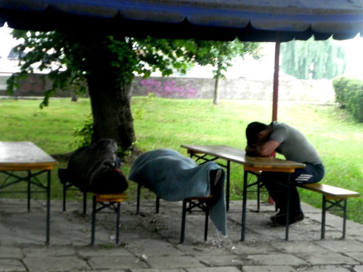 Not sure what happened here... perhaps the one with his head on the table is praying to God for the sake of his companions to wake up. "God, I have not force them to drink, I have not!", Lugoj, Romania, Once upon a time