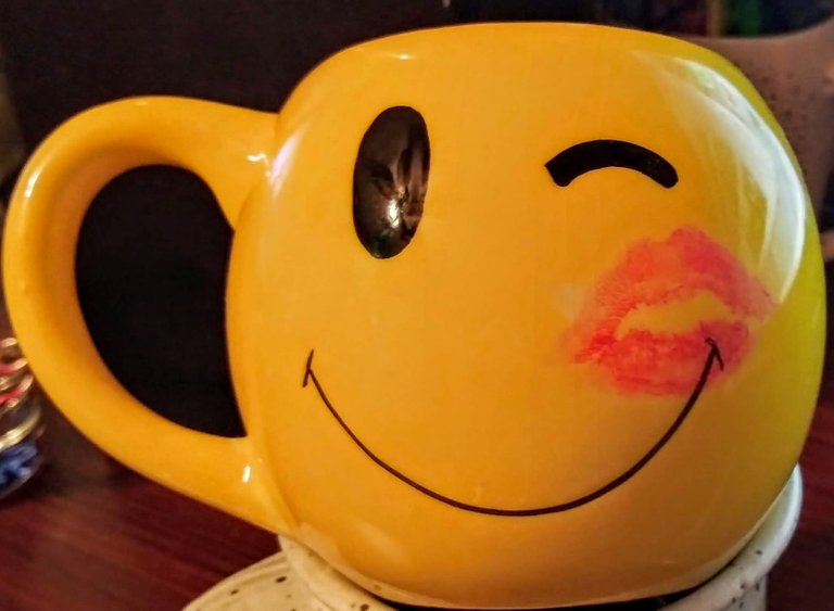 coffee cup kiss.jpg