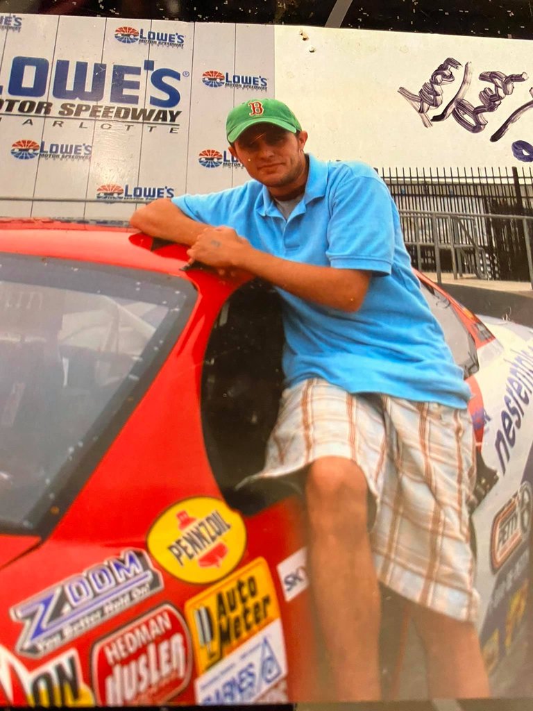 aaron with race car.jpg