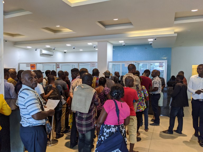 Bank lines (on a good day)  in EcoBank Monrovia, several months after the onset of the banking crisis.