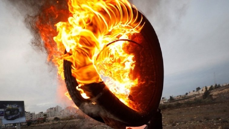 SABC-News-Burning-Tyre-Reuters.jpg