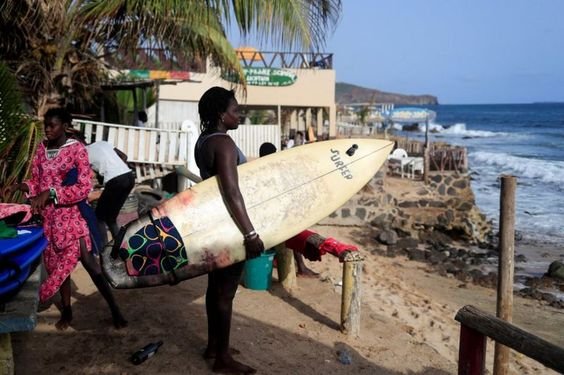Senegal's first female Khadjou Sambe25defied social xpectations to ride the Atlantic waves..jpg