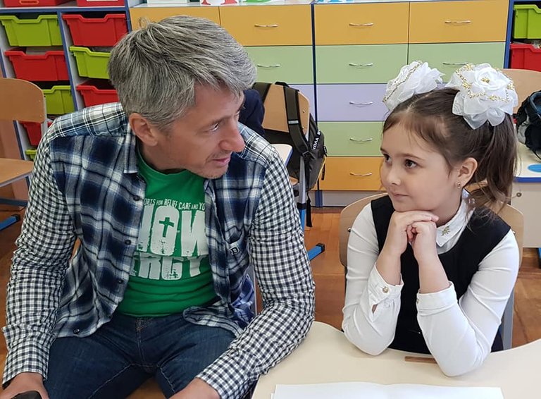 Oleg, a leading MERCY Ambassador in Kyiv, engages with one of the students