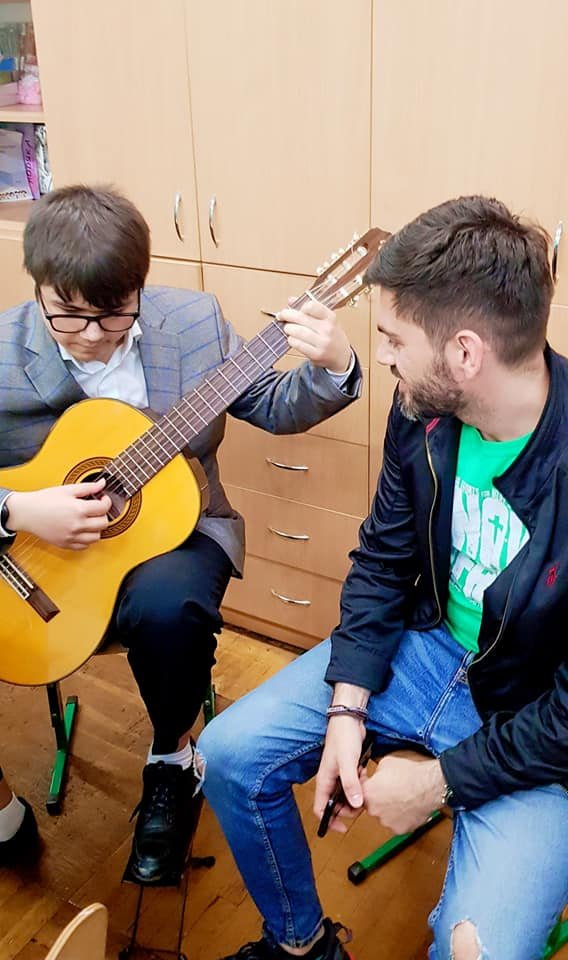 The children of the Kyiv school are smart and talented. Here is one displaying his guitar skills.