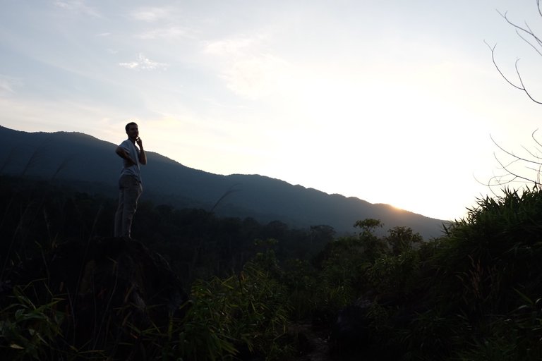 Sam, admiring the sunset over the mountains