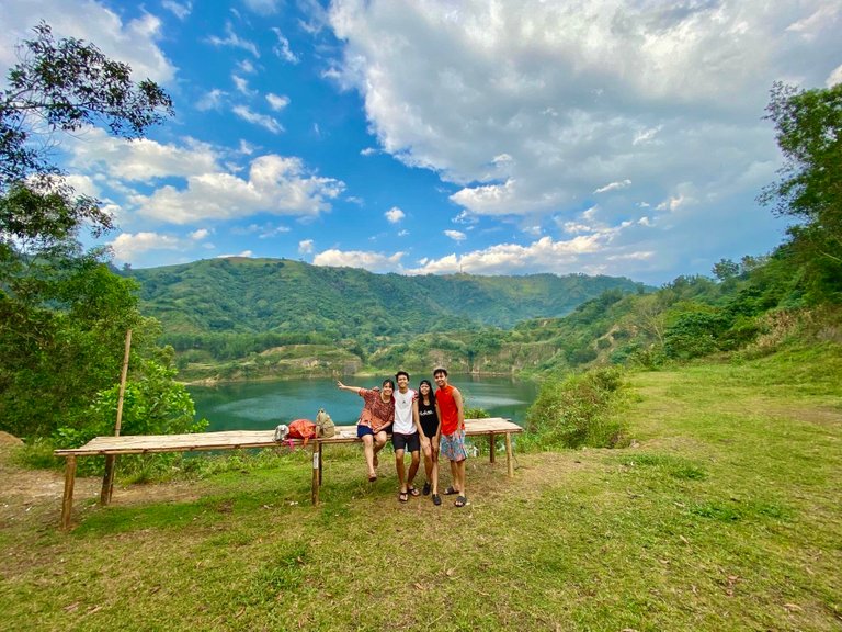 The second drop off point at a cliff. Bamboo tables have been created to accommodate visitors. Although this area is also an adequate campsite, this path is often used to descend to the foot of the lake. 